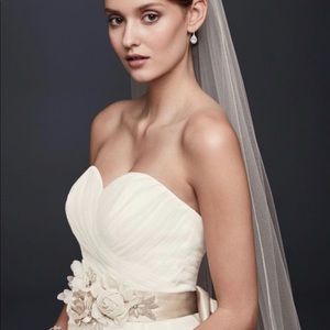Strapless tulle wedding gown